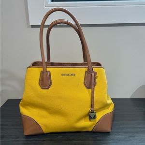 Leather and Canvas Yellow Michael Kors handbag.